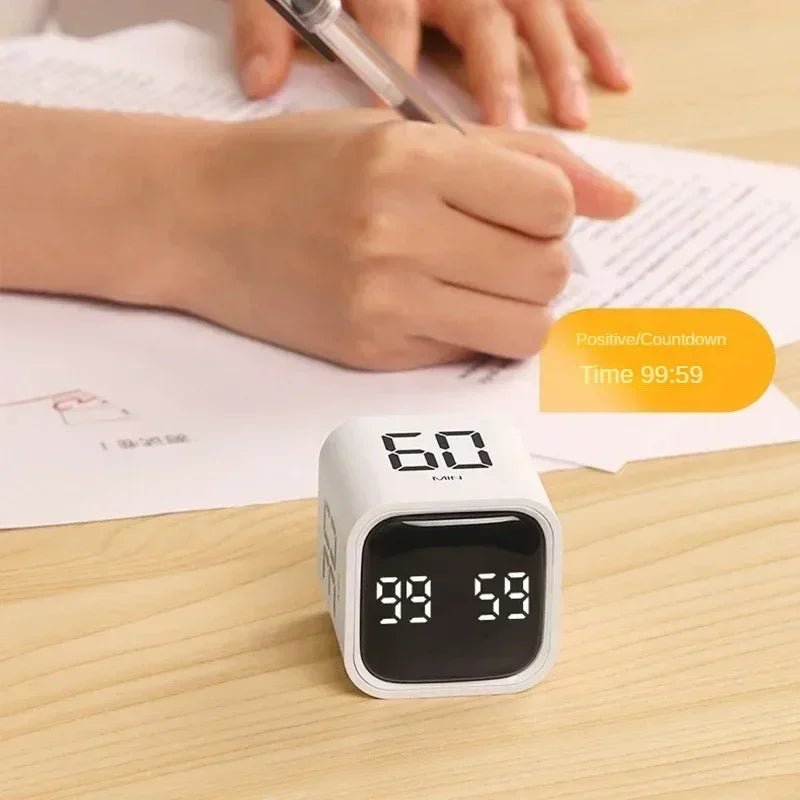 Lockin Cube counting down next to someone studying